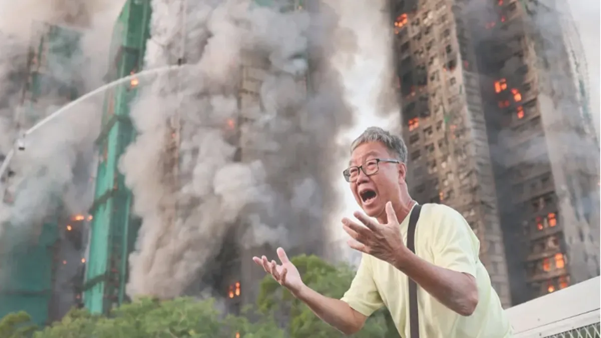 Fire engulfs Hong Kong residential blocks, killing at least 13