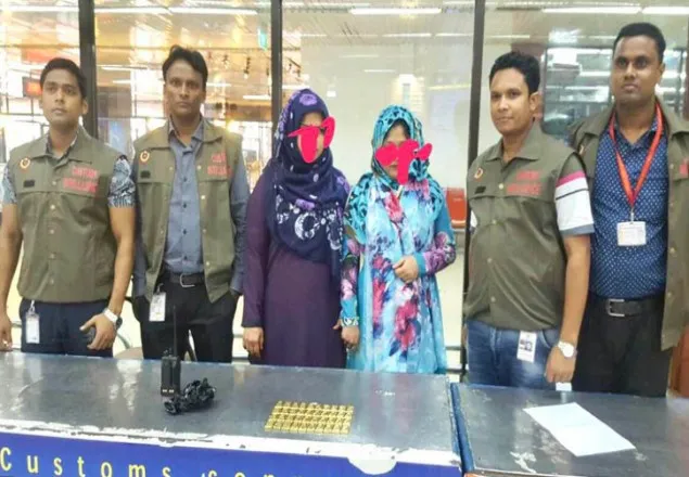 শাহজালালে ৪০ স্বর্ণের বারসহ দুই নারী অাটক