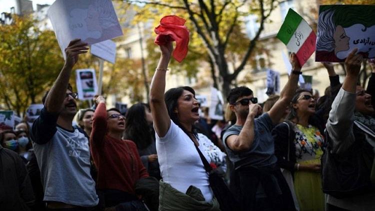 Iran police warn protesters of harder action