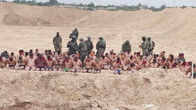 Palestinian men shown stripped, kneeling in front of Israeli military in Gaza: report