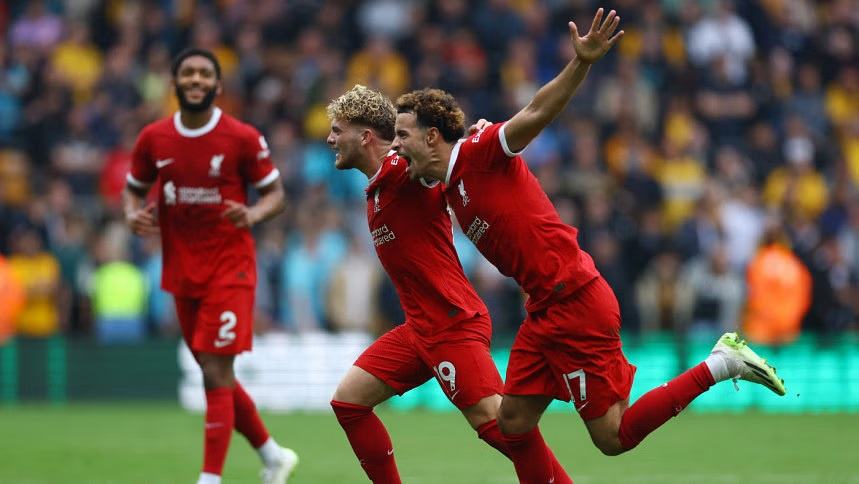 Liverpool tame Wolves with two late goals