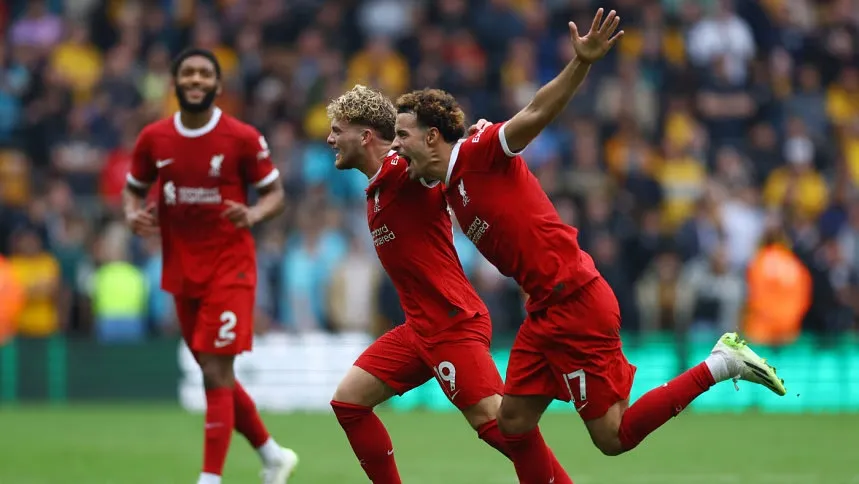 Liverpool tame Wolves with two late goals