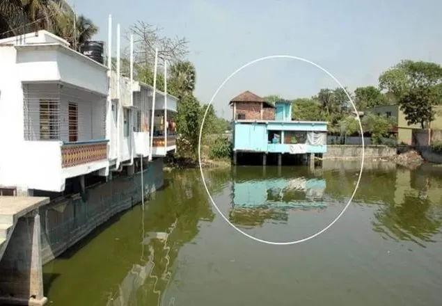যশোরের শার্শায় হাকর নদী দখল করে গড়ে উঠেছে ভবন