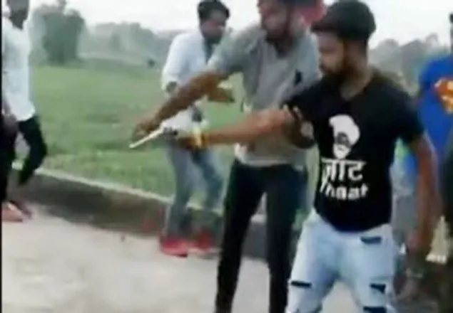 গুলি করে জন্মদিনের কেক কাটলো যুবক (ভিডিও)
