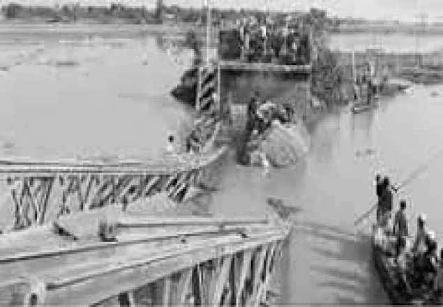 ব্রিজ ভেঙে বালুবোঝাই ট্রাক খালে যান চলাচল বন্ধ