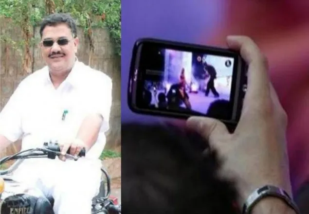 মঞ্চে বসে মোবাইলে পর্ন দেখছেন শিক্ষামন্ত্রী