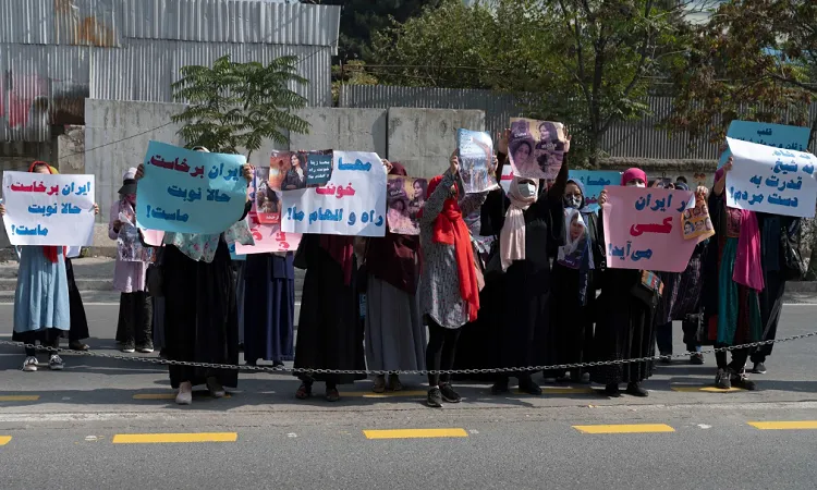 Taliban fire into air to disperse women’s rally supporting Iran protests