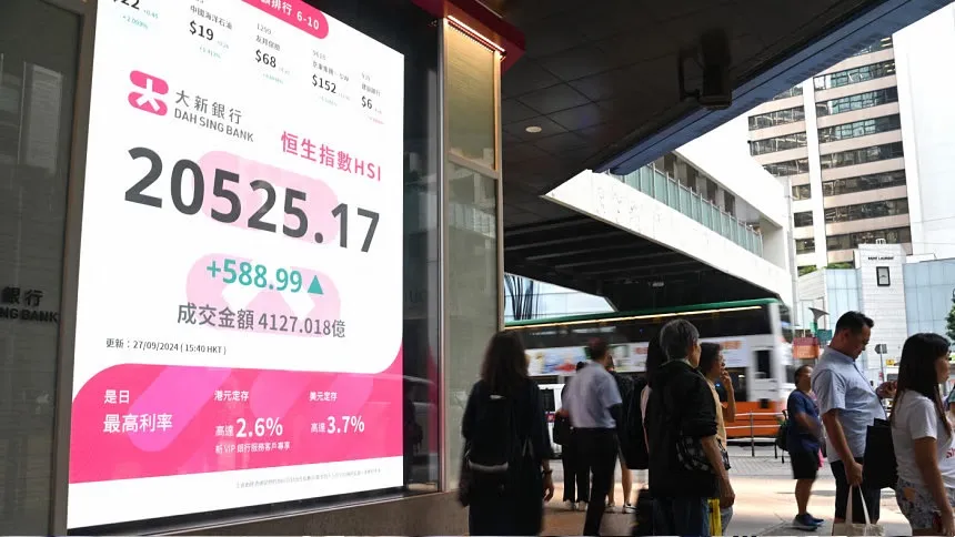 Most Asian markets drop, dollar gains as Trump fires tariff warning