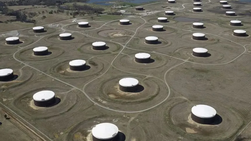 Oil falls on higher US oil stocks, inflation data in focus