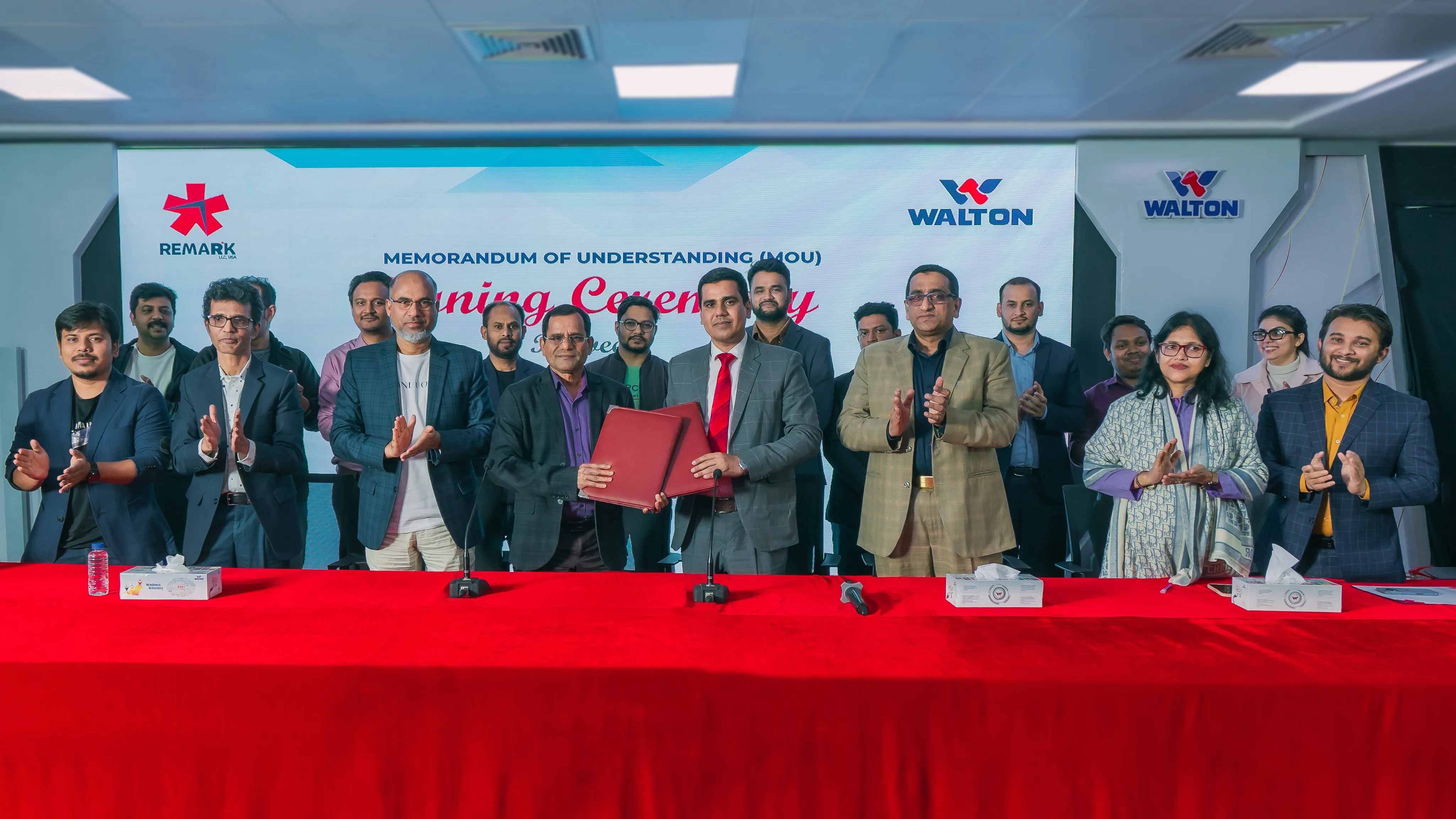 যুক্তরাষ্ট্রের রিমার্ক এলএলসি’র অ্যাফিলিয়েটেড প্রতিষ্ঠান রিমার্ক এইচবি ও ওয়ালটনের মধ্যে সমঝোতা চুক্তি