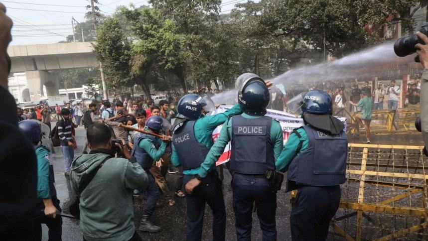 Police disperse protesters with water cannons, sound grenades