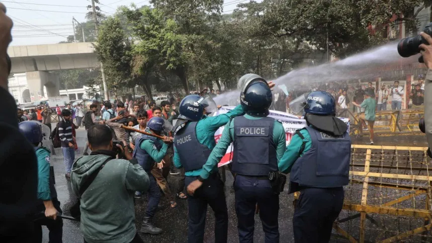 Police disperse protesters with water cannons, sound grenades