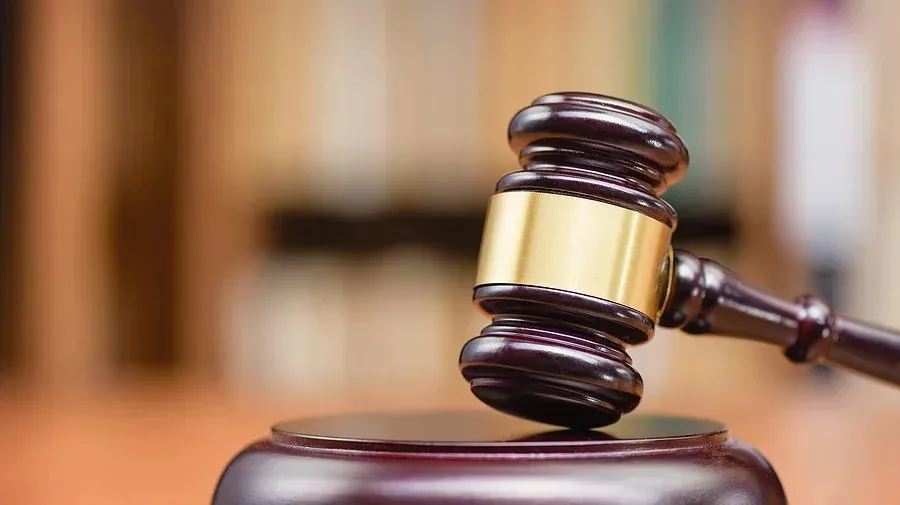 Two remanded for attacking OC in Rajbari