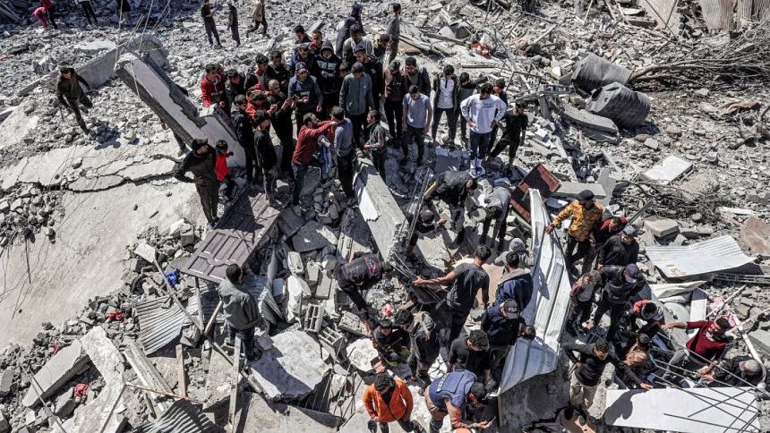 Gaza health ministry says war death toll at 31,988