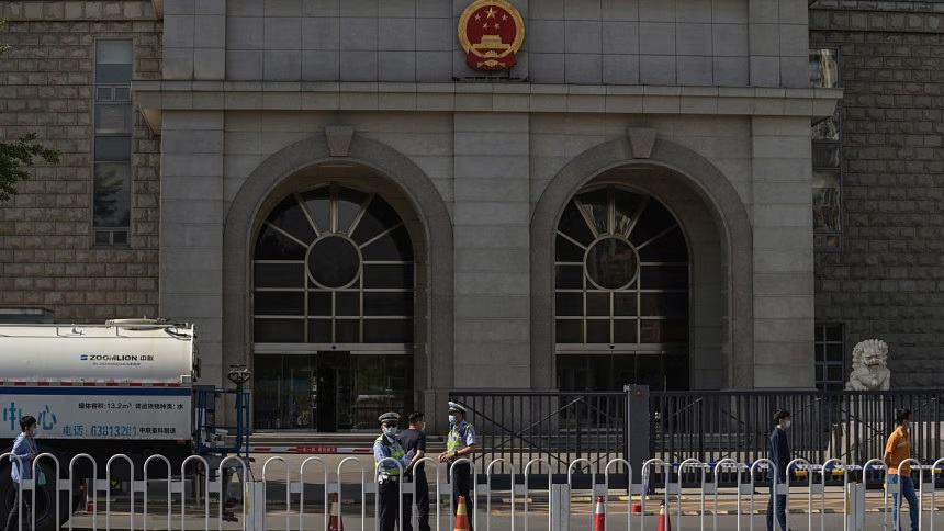 Australia says writer Yang Jun given suspended death sentence in China