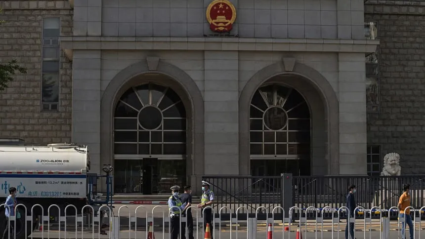 Australia says writer Yang Jun given suspended death sentence in China