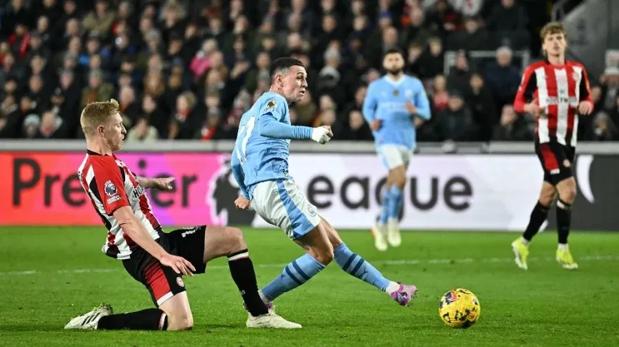Foden hat-trick hauls City within two points of Premier League lead