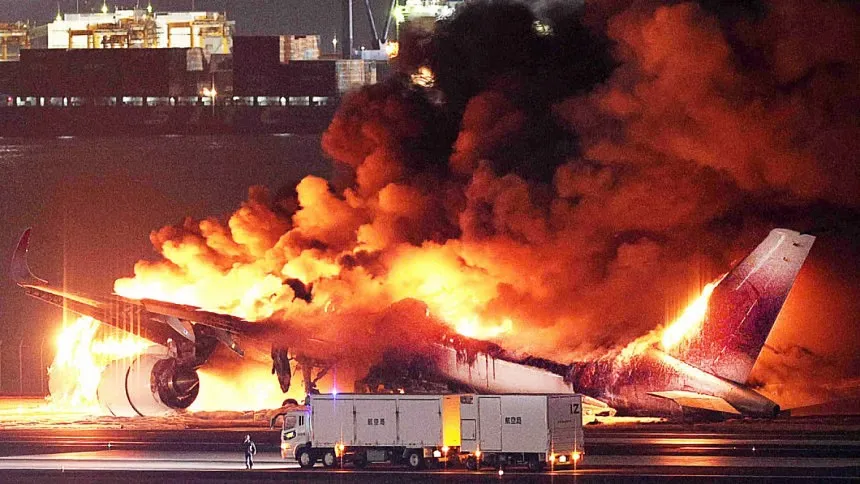 Japan investigators probe conflicting reports on fiery Tokyo crash