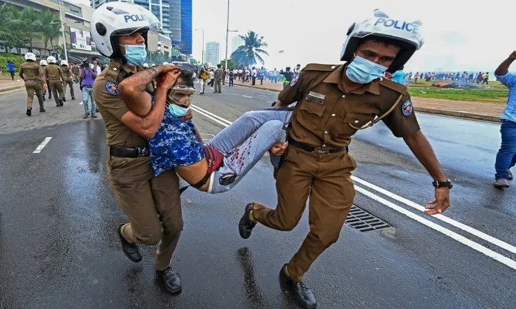 Sri Lanka Imposes Curfew as Government Backers, Protesters Clash