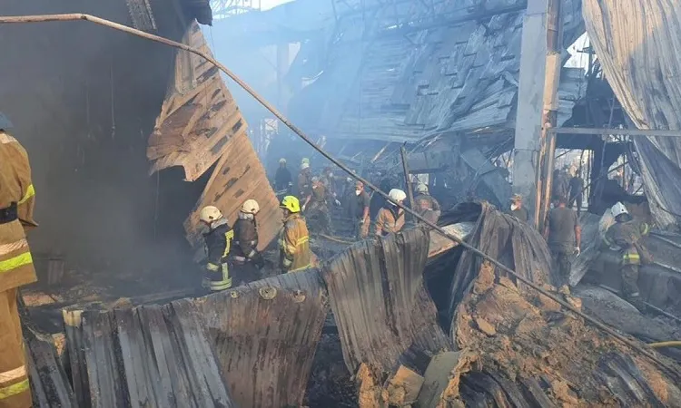 Rescuers dig for survivors of Russian missile strike on Ukrainian shopping mall
