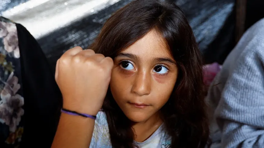 Gaza families wear ID bracelets to avoid burial in mass graves
