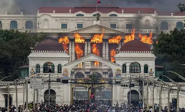Nepal protesters set parliament ablaze as PM quits