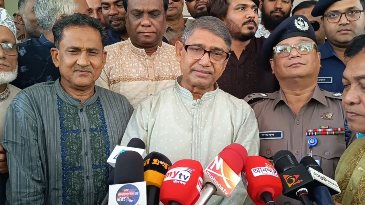 মি