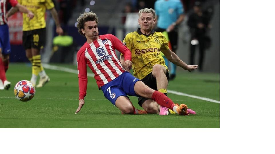 Atletico will have to suffer at Dortmund: Griezmann