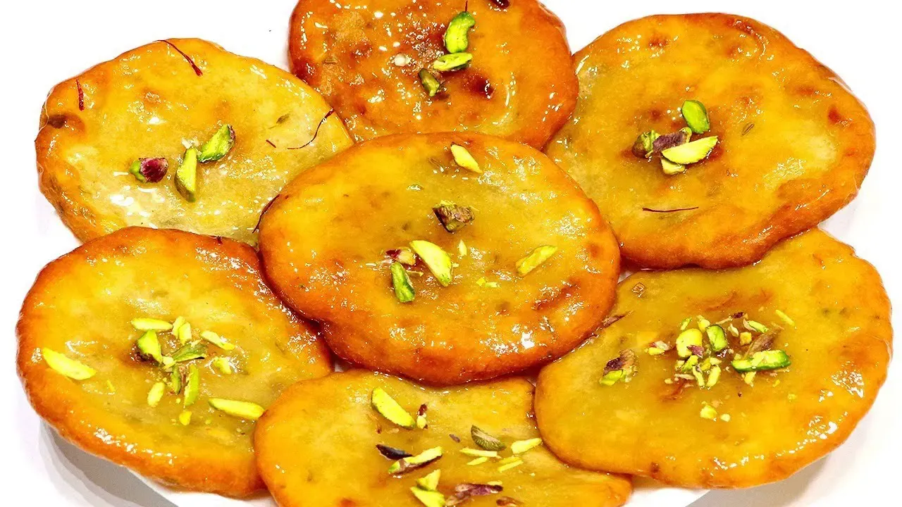 পাকা আমের পোয়া পিঠা তৈরির রেসিপি !