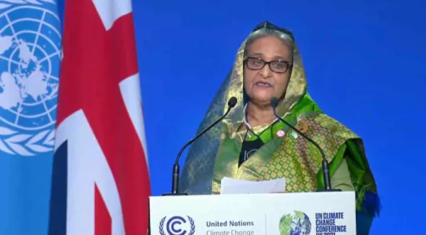 বিশ্বকে জলবায়ু অভিবাসীদের দায়িত্ব ভাগ করে নিতে হবে : প্রধানমন্ত্রী